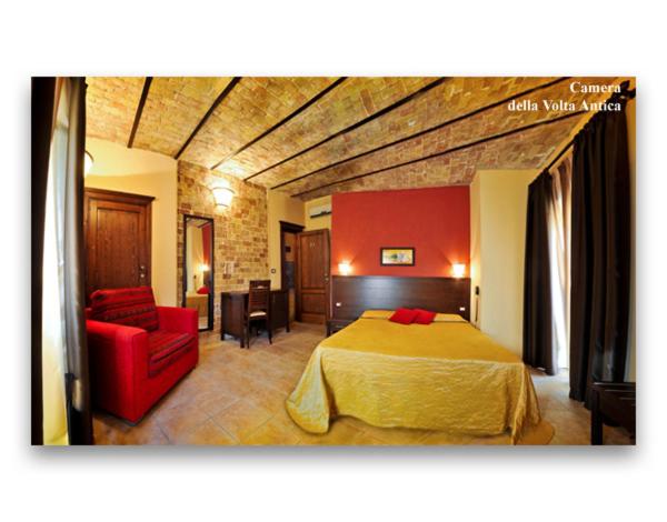 Postel nebo postele na pokoji v ubytování B&B Liu' Palazzo Ducale