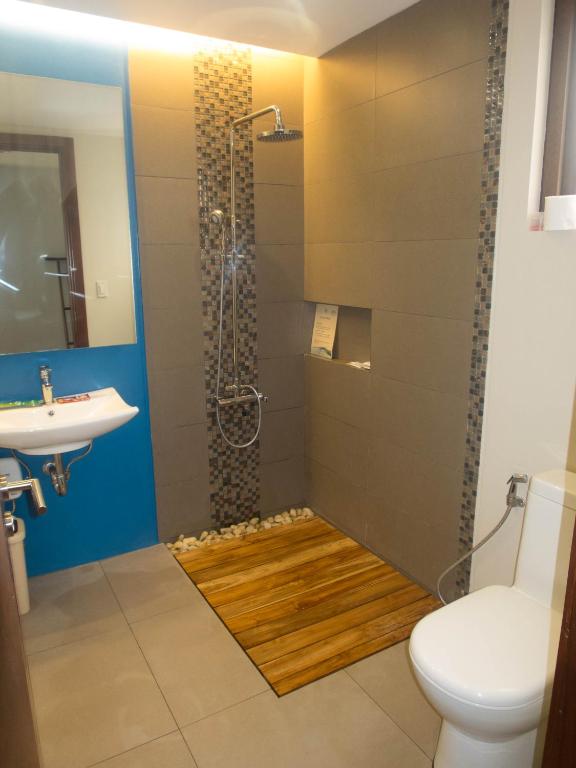 Karancho Beach House - Deluxe Triple Room