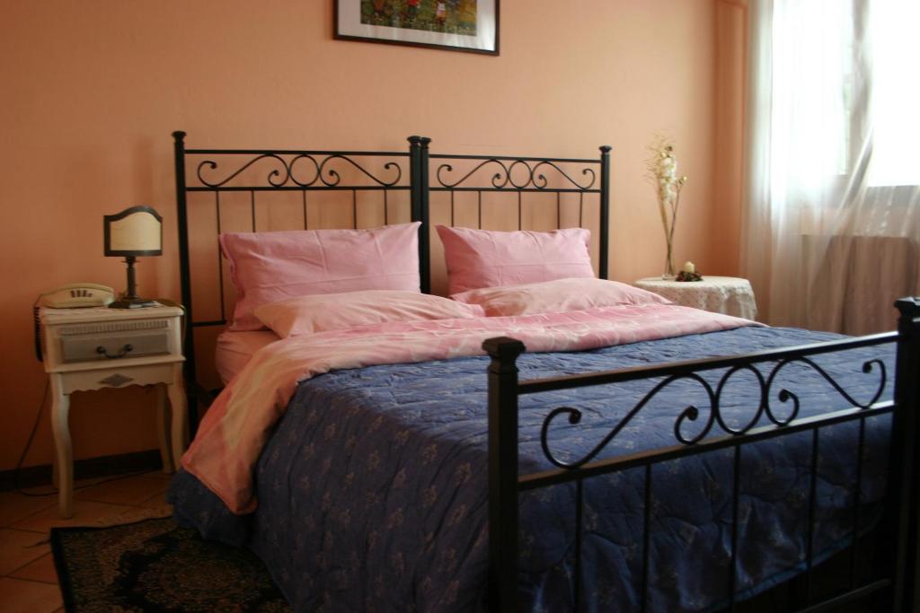 Postel nebo postele na pokoji v ubytování Hotel La Selce