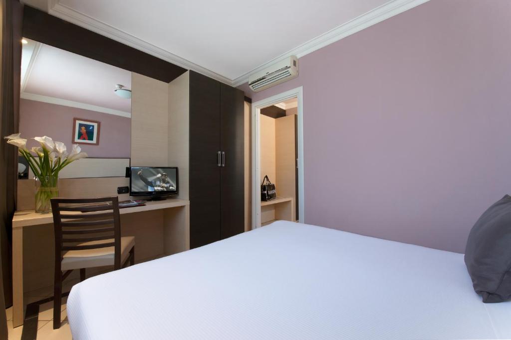 Postel nebo postele na pokoji v ubytování CDH Hotel La Spezia