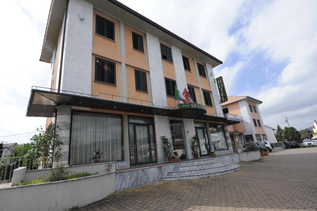 a building on the side of a street at Hotel Sextum in Bientina