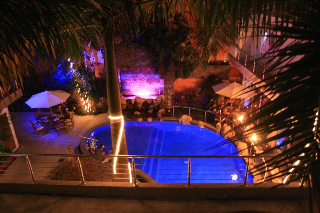 Bazén v ubytování Hotel Rio Malecon nebo v jeho okolí