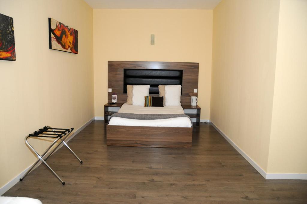 Postel nebo postele na pokoji v ubytování Hotel Morez