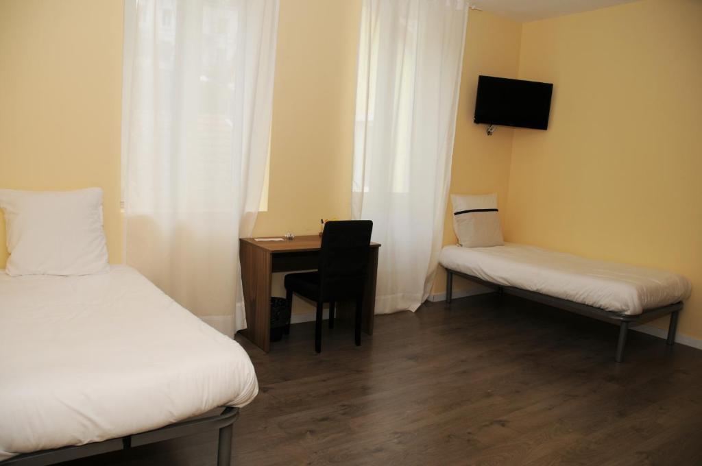 Postel nebo postele na pokoji v ubytování Hotel Morez