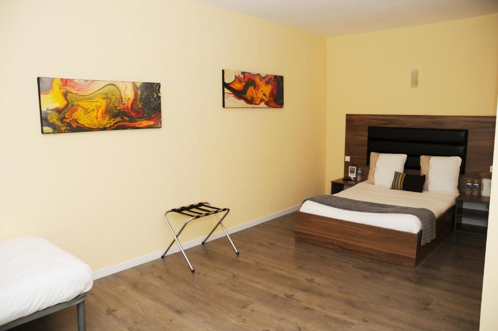 Postel nebo postele na pokoji v ubytování Hotel Morez