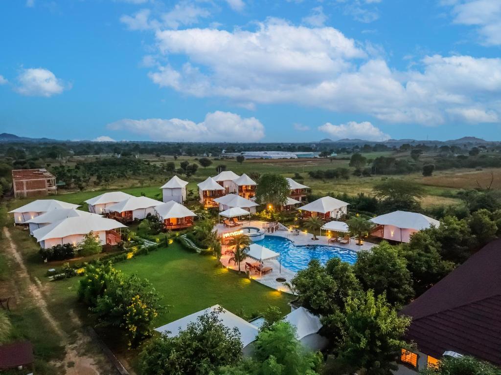 an aerial view of a resort with a swimming pool at Luxe Stayz Signature Pushkar in Pushkar