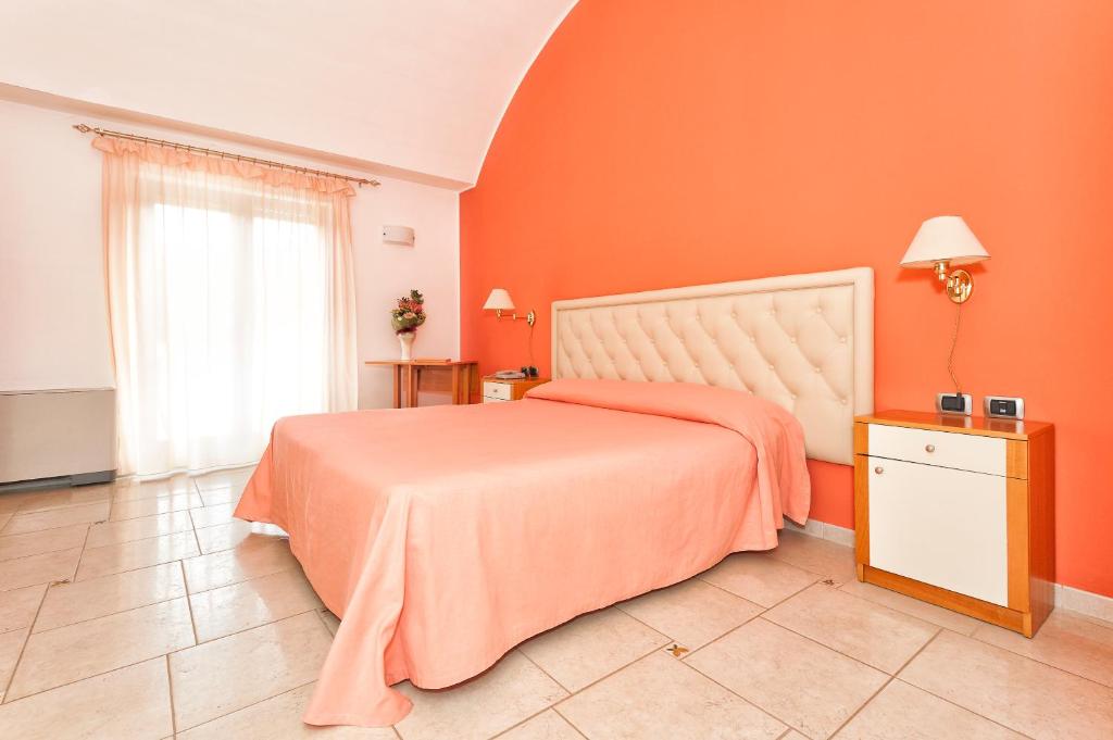 Postel nebo postele na pokoji v ubytování Masseria Chiancone Torricella