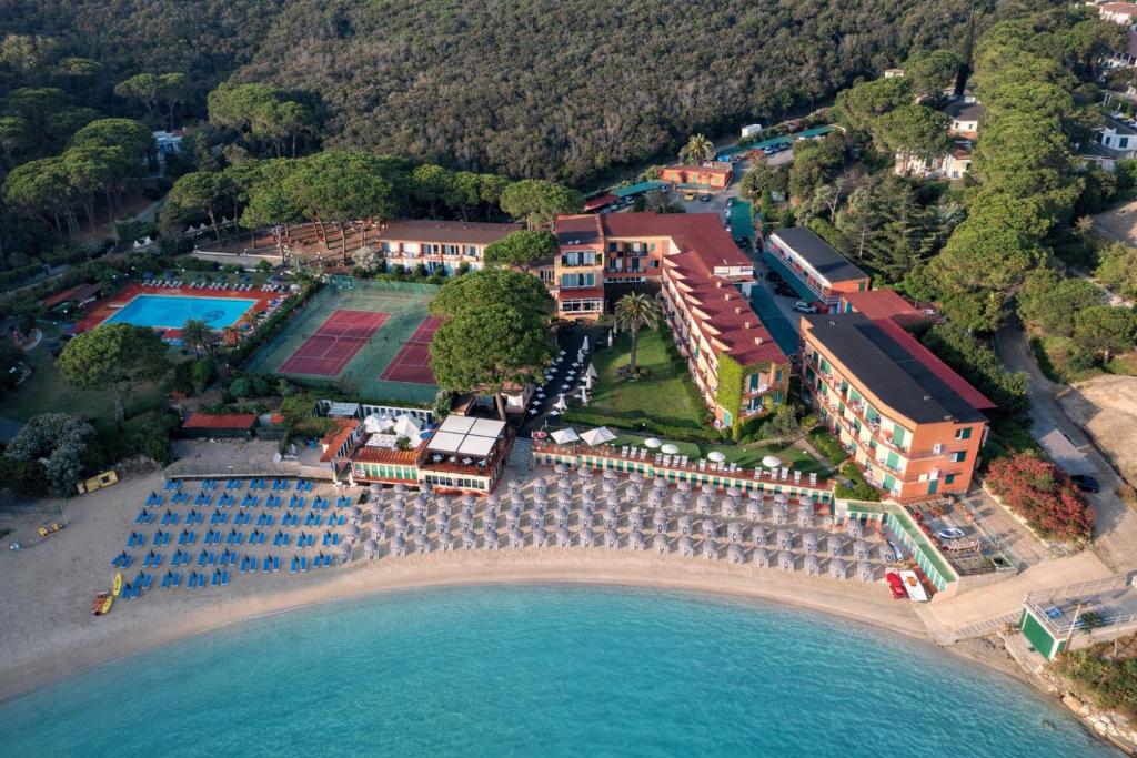 an aerial view of a resort on the beach at Hotel Desiree in Procchio
