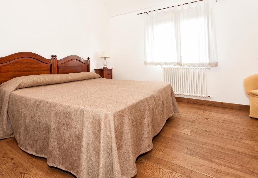 Postel nebo postele na pokoji v ubytování Masseria Chiancone Torricella