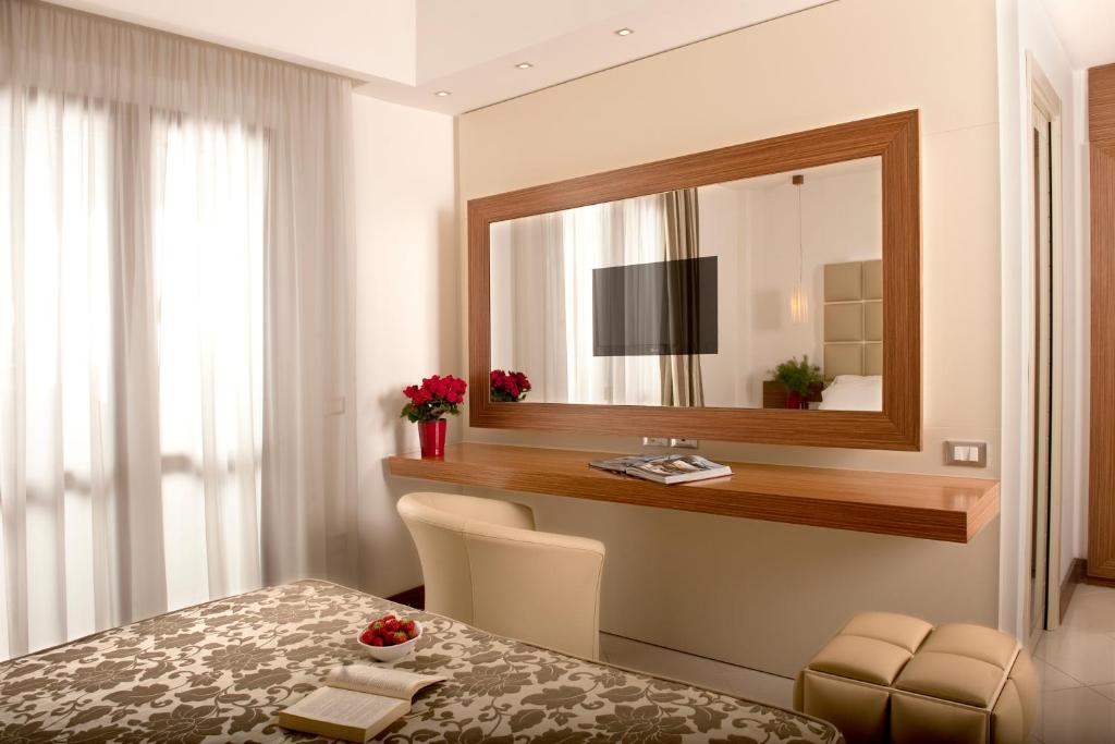 TV a/nebo společenská místnost v ubytování OC Hotel