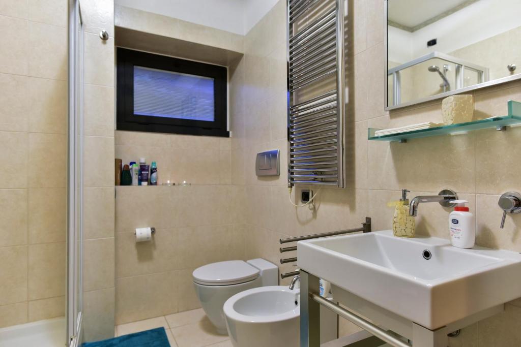 Łazienka w obiekcie Home Sorbara "Luxury Home"