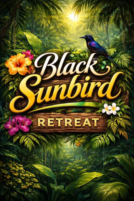 a black bird sitting on a sign in the jungle at Black Sunbird Retreat in Heidelberg