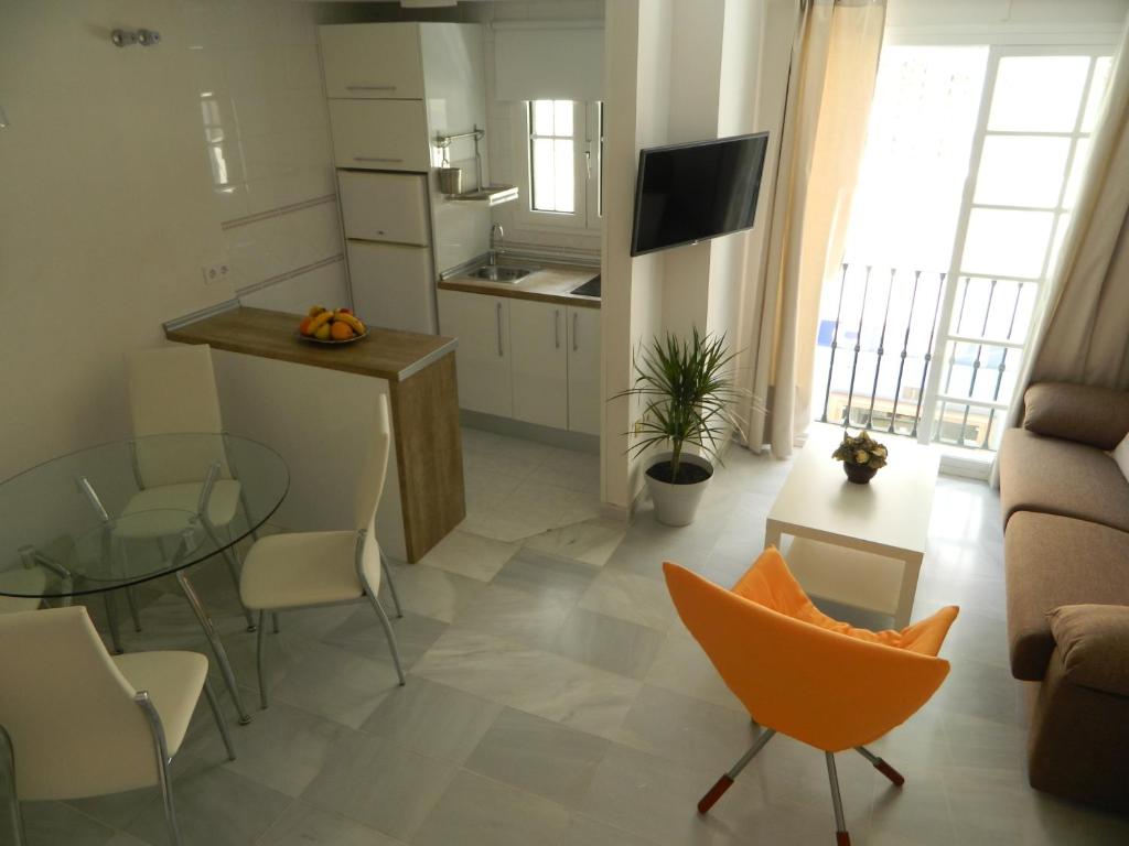 TV a/nebo společenská místnost v ubytování Apartamento Miramar