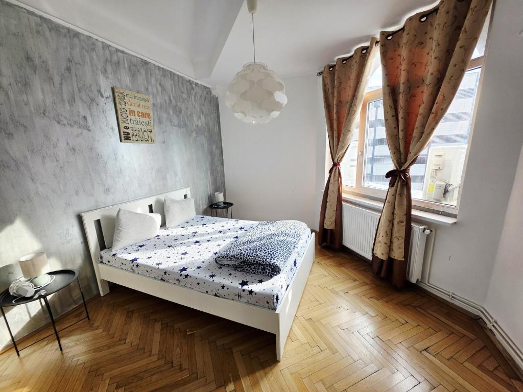 Llit o llits en una habitació de StayInn