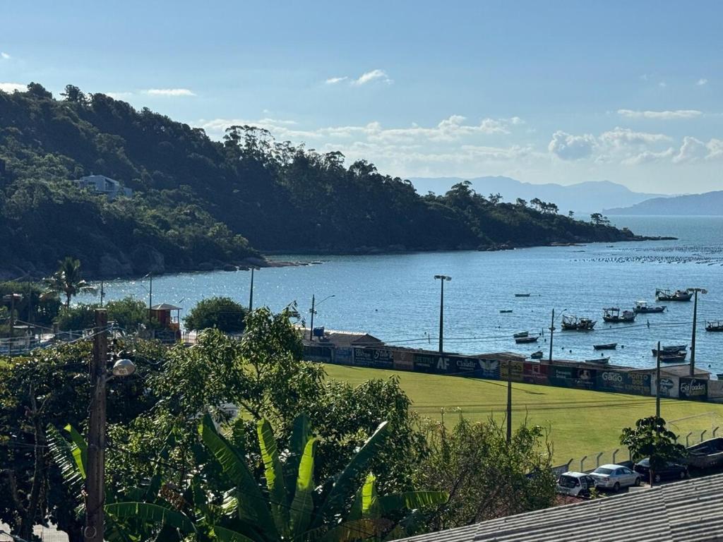a view of a harbor with boats in the water at Casa Brisa do Mar in Governador Celso Ramos