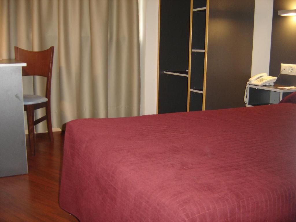 Postel nebo postele na pokoji v ubytování Hotel Alfinden