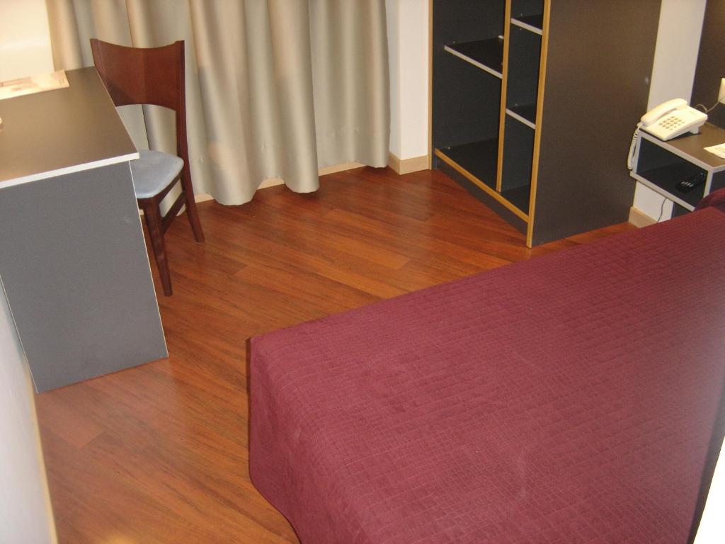 Postel nebo postele na pokoji v ubytování Hotel Alfinden