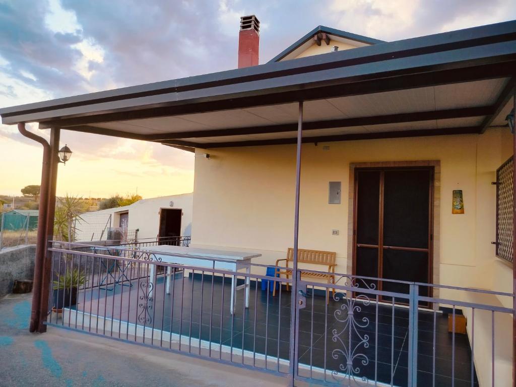 awning over a patio of a house at CASA NATURA - CAMPAGNA e MARE - in Marconia