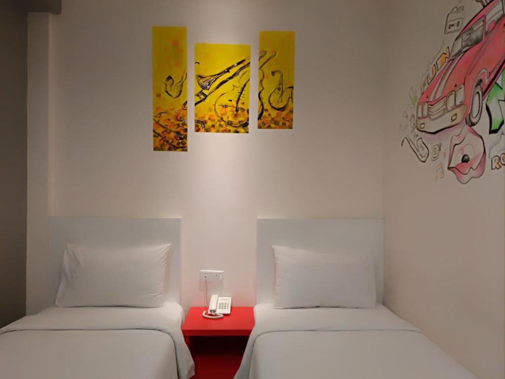 Postel nebo postele na pokoji v ubytování Hotel Strawberry Fields