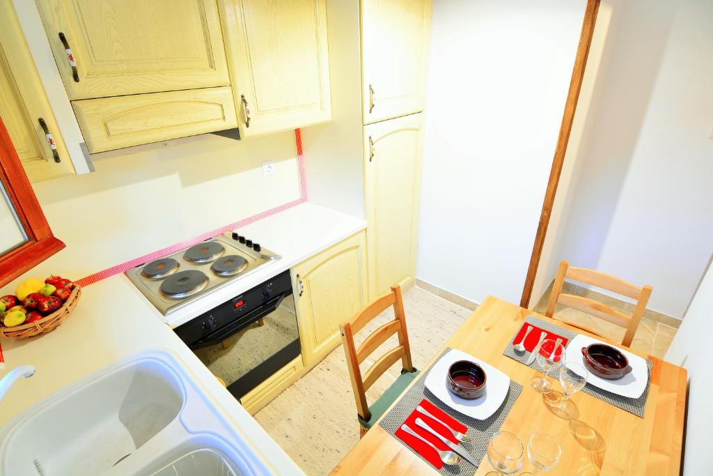 Kuchyň nebo kuchyňský kout v ubytování Italiano Bed & Breakfast