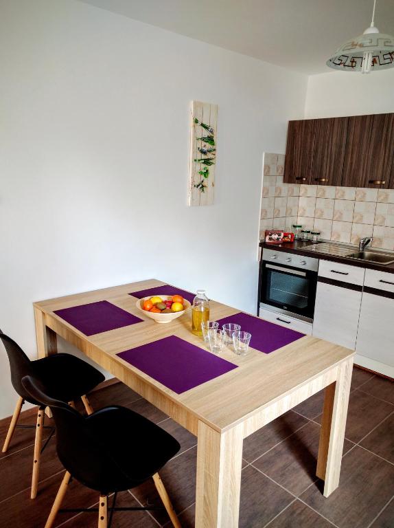 Kuchyň nebo kuchyňský kout v ubytování Apartments Tome