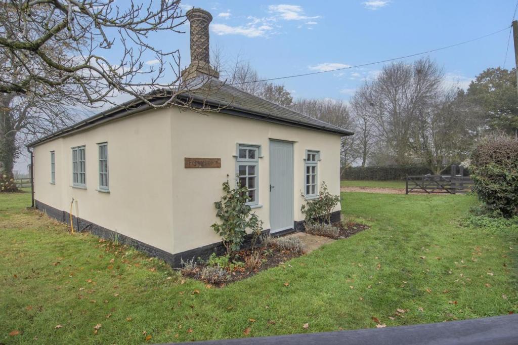 an old house with a chimney on top of it at 2 Bed in Bressingham oc-f33646 in Bressingham