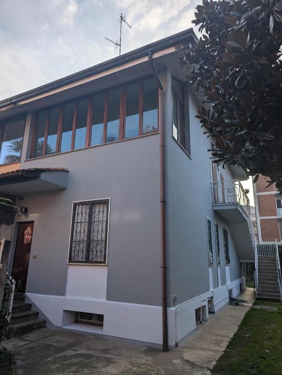 a white building with a lot of windows at Casafiorella in Monza