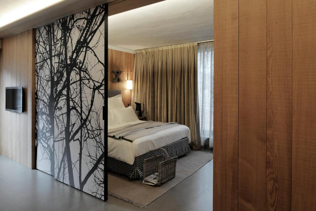Letto o letti in una camera di Eden Hotel