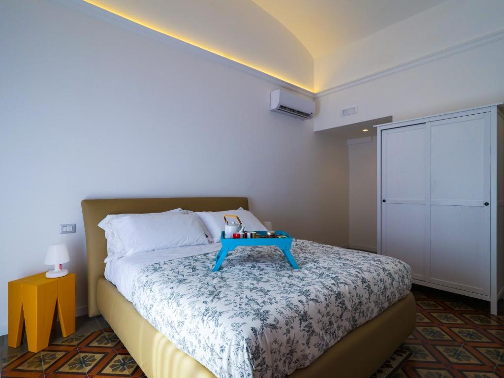 Ένα ή περισσότερα κρεβάτια σε δωμάτιο στο B&B Sciara Larmisi