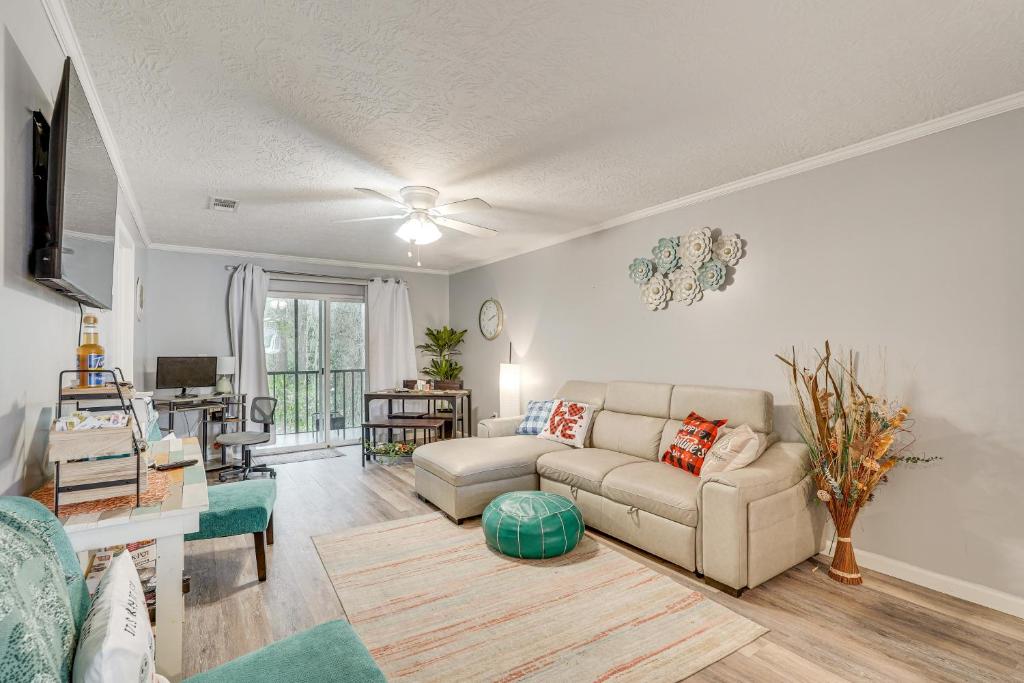 a living room with a couch and a table at 7 Mi to Downtown Fun! Spacious Augusta Condo in Augusta