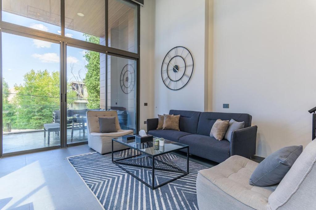 Zona d'estar a Stunning 4 Bedroom Duplex