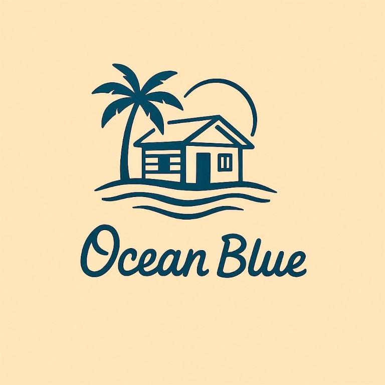 a house on the island with a palm tree andcriptions ocean blue at Ocean Blue in Huanchaco