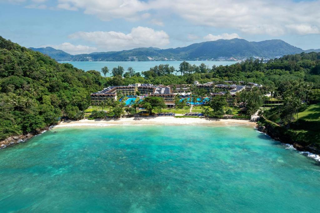 an aerial view of a resort on a beach at Phuket Marriott Resort & Spa, Merlin Beach in Patong Beach