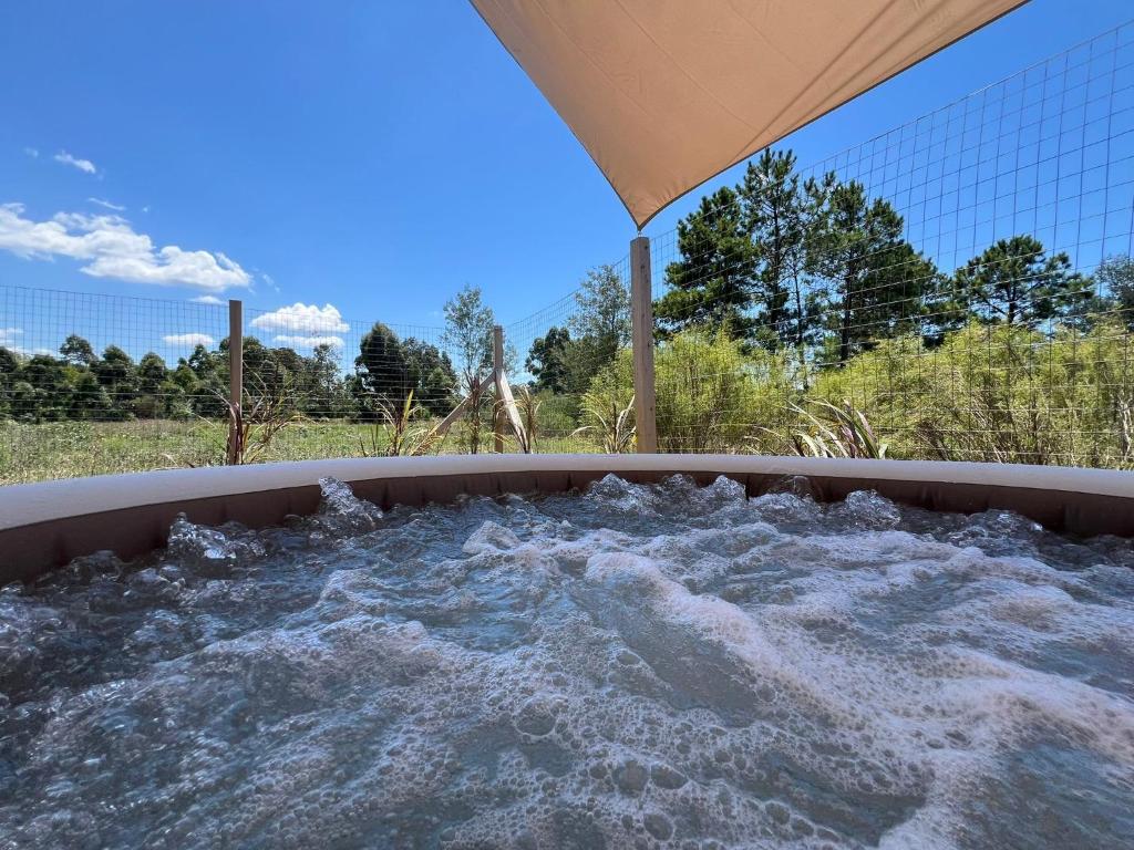 a jacuzzi tub with water in it at MiRe- Alojamiento con jacuzzi in Maldonado