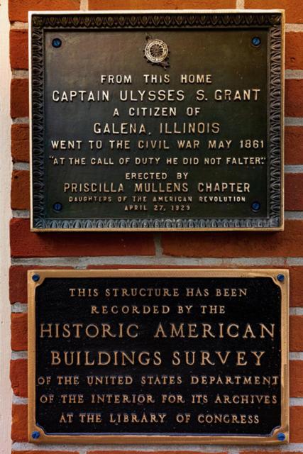 a sign on the side of a brick building at US Grant Guest House in Galena