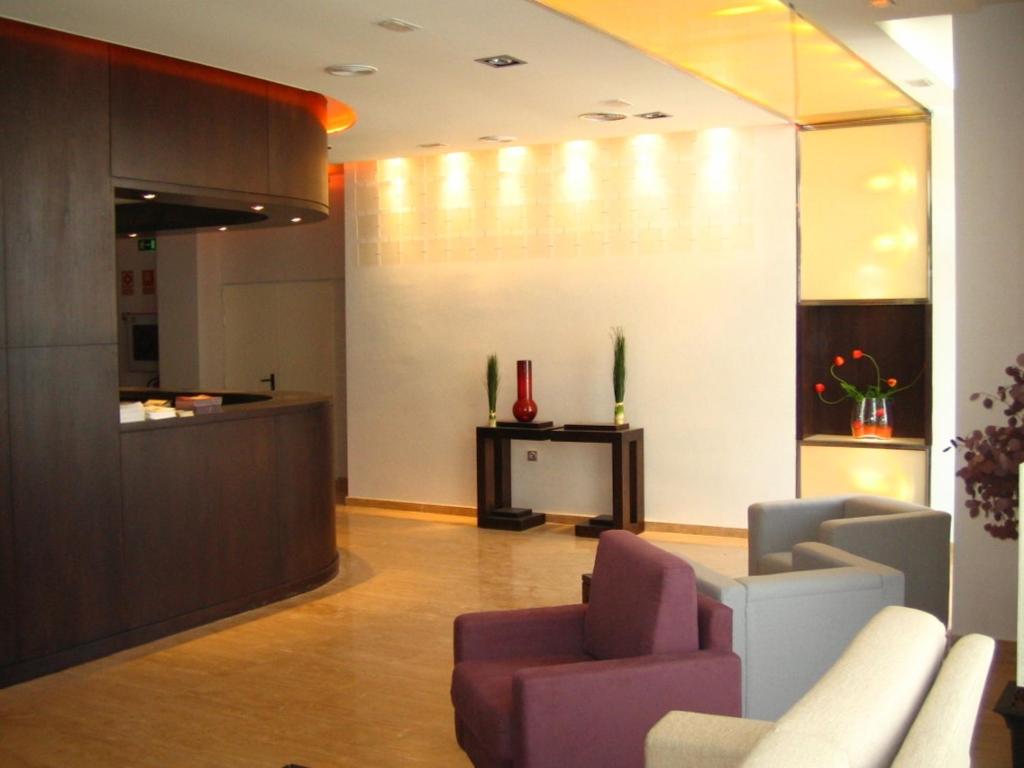 Posezení v ubytování Hotel Puerta de Ocaña