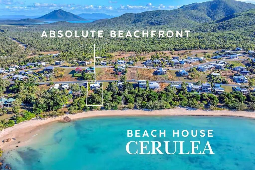 an aerial view of beach house ceville at Absolute Beachfront with Ocean Views 3 Beds plus Pool in Hideaway Bay