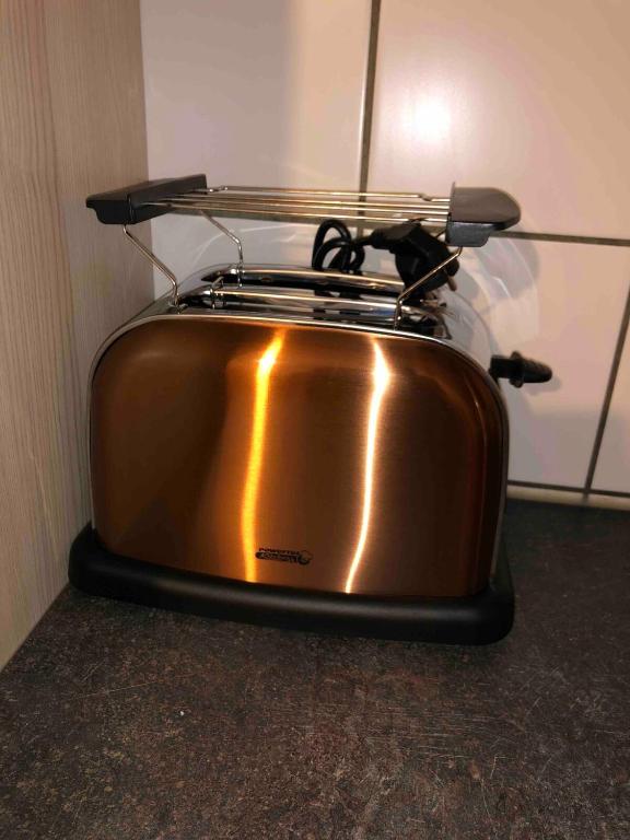 a toaster oven sitting on top of a counter at notre petit paradis in Winnenden