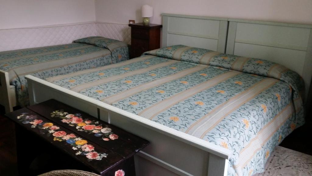 Postel nebo postele na pokoji v ubytování B&B Francesco in Assisi