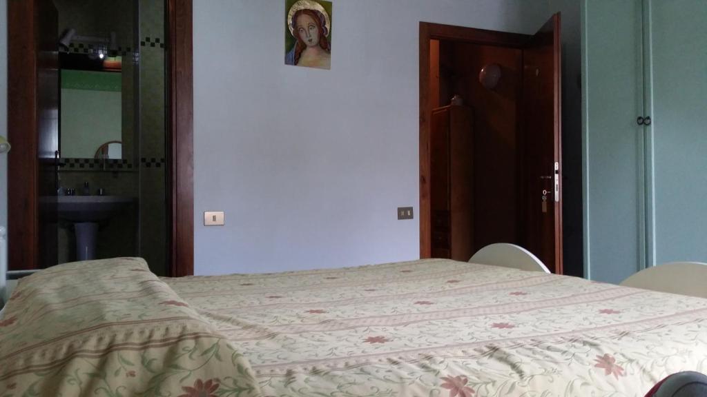 Postel nebo postele na pokoji v ubytování B&B Francesco in Assisi