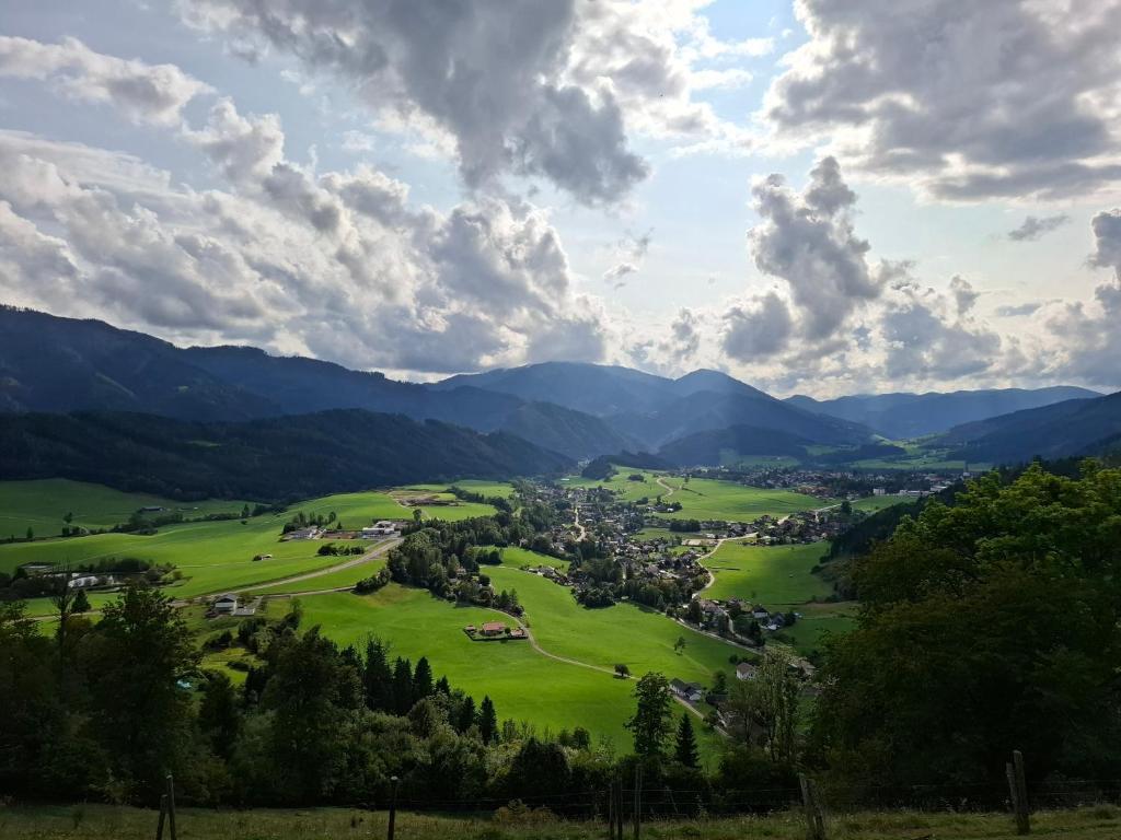 a view of a town in a valley with mountains at Sterisches Daham in Aflenz Kurort
