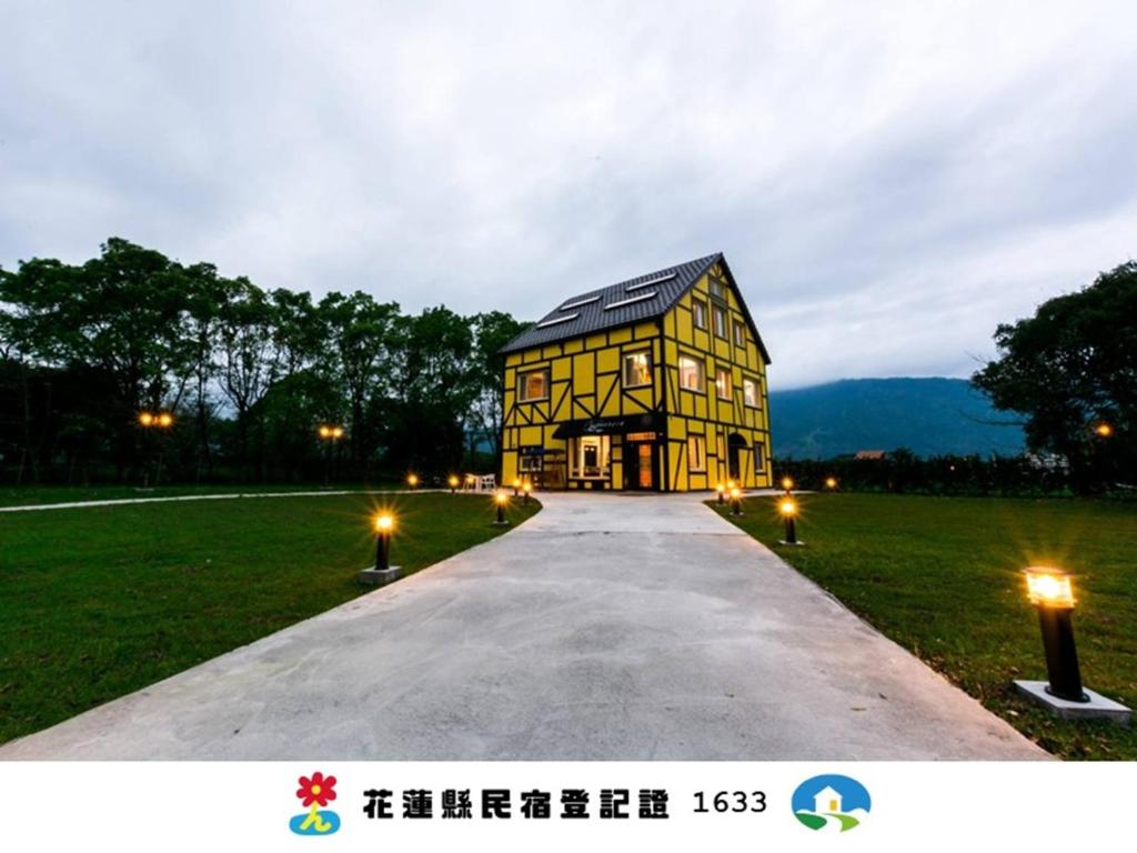a house in the middle of a field at Elizabeth Bed and Breakfast in Fengli