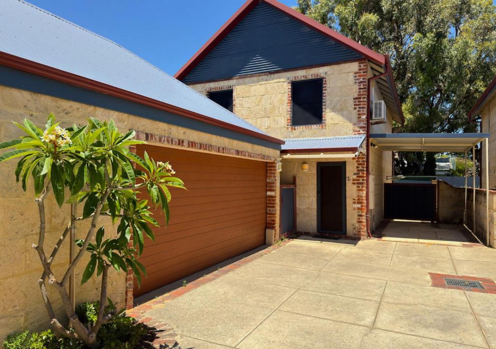 a house with a garage and a driveway at Radford Retreat in Safety Bay