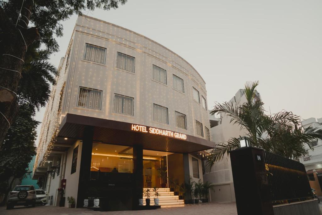 a building with a sign on the front of it at Hotel Siddharth Grand in Varanasi