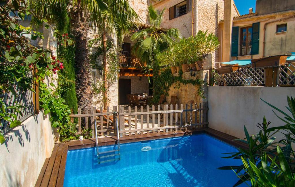 a swimming pool in the middle of a building at La Casa De Los Espejos in Capdepera
