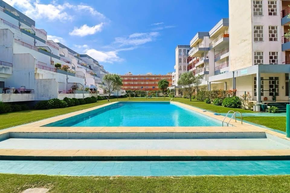 an image of a swimming pool in a apartment complex at Refugio do Atlântico in Marinhas
