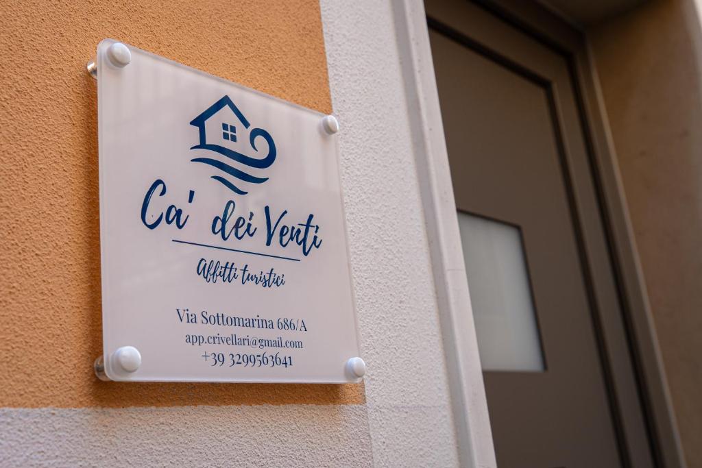 a sign on the side of a building at Ca' dei Venti in Chioggia