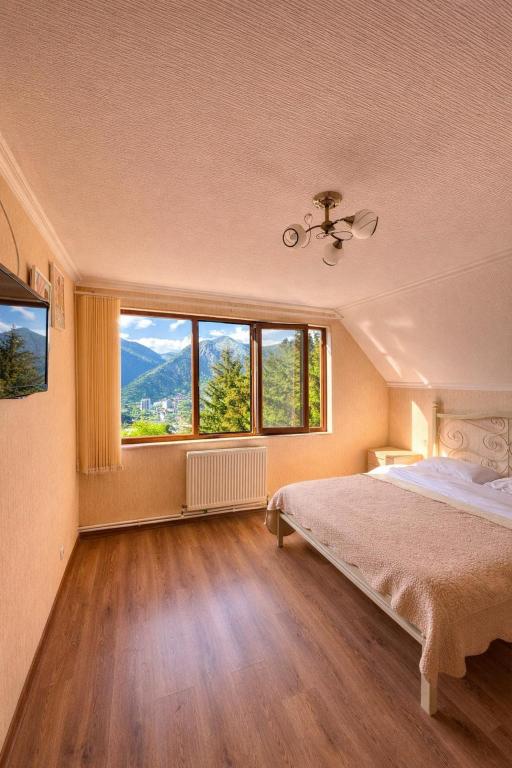 Llit o llits en una habitació de Hotel forest echo