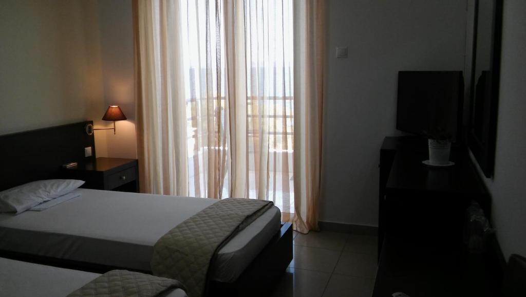 Postel nebo postele na pokoji v ubytování Tokalis Boutique Hotel & Spa
