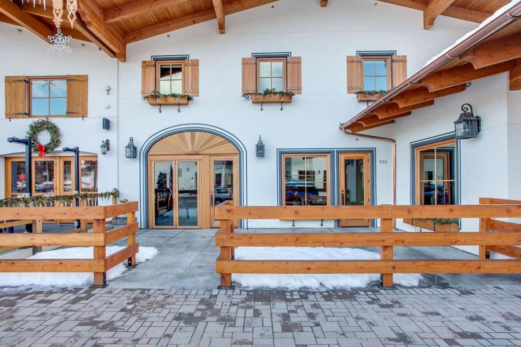 an entrance to a building with a wooden fence at Valhalla - Pacific Retreats in Leavenworth